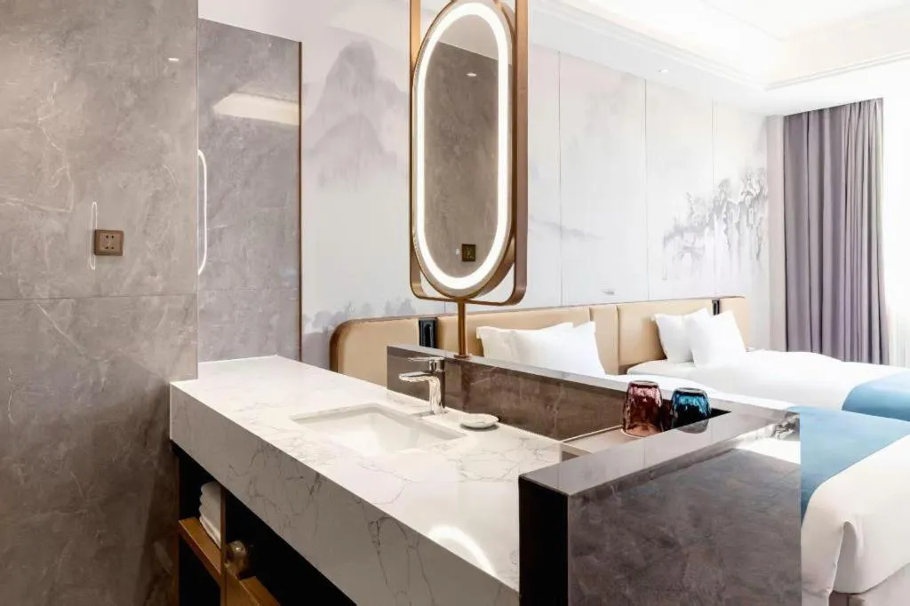 Bed in Nanning Yongjiang Hotel