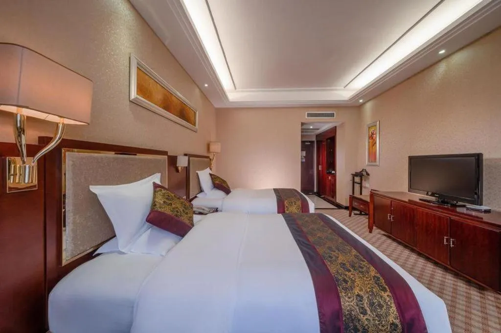 Bed in Nanning Yongjiang Hotel