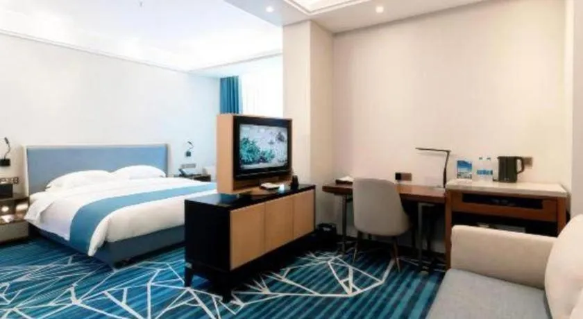 Bed in Nanning Yongjiang Hotel