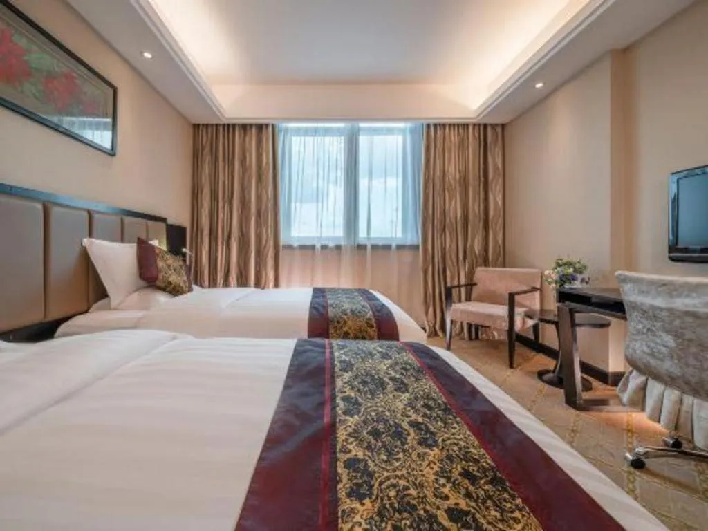 Bed in Nanning Yongjiang Hotel