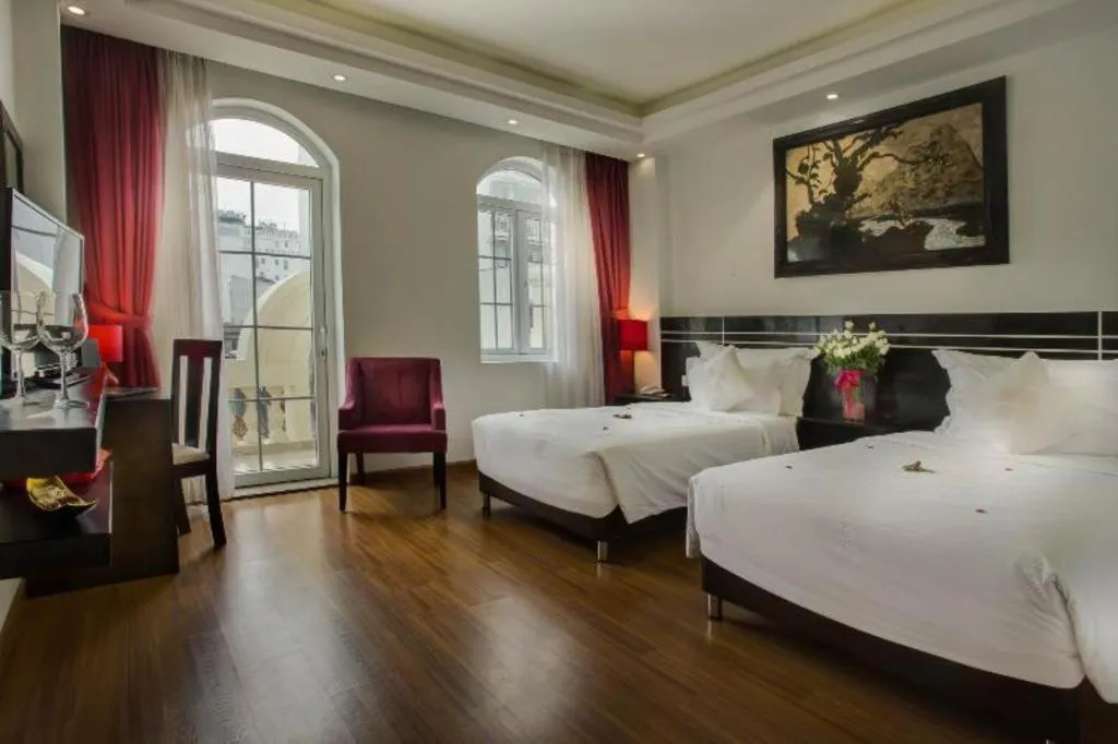 Bed in Hotel Des Arts – The Noble
