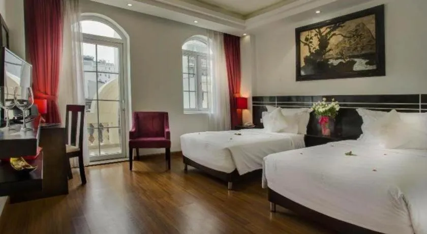 Bed in Hotel Des Arts – The Noble