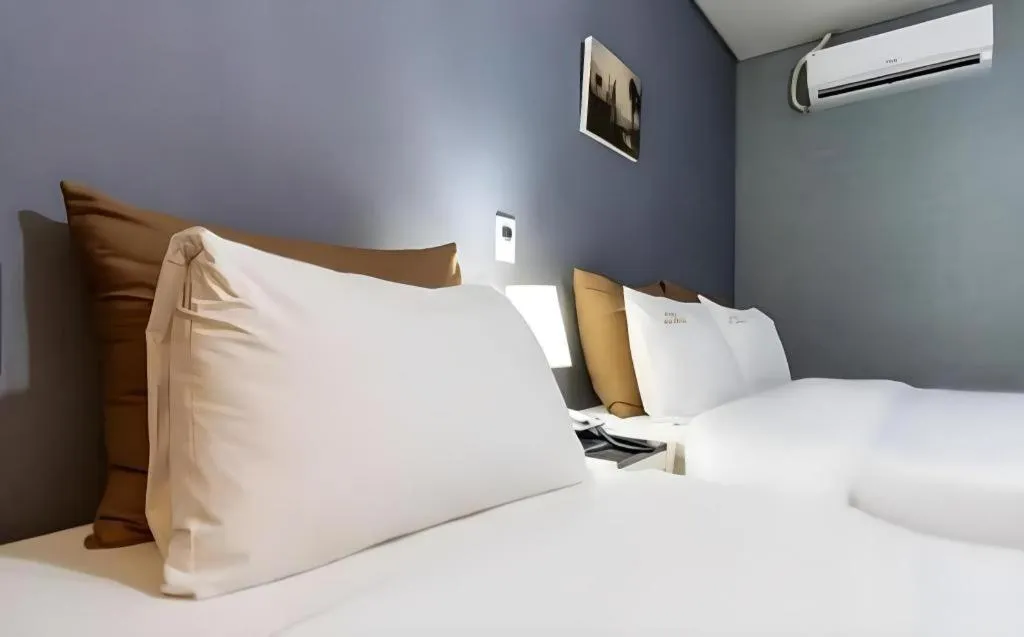 Bed in BENIKEA Technovalley Hotel