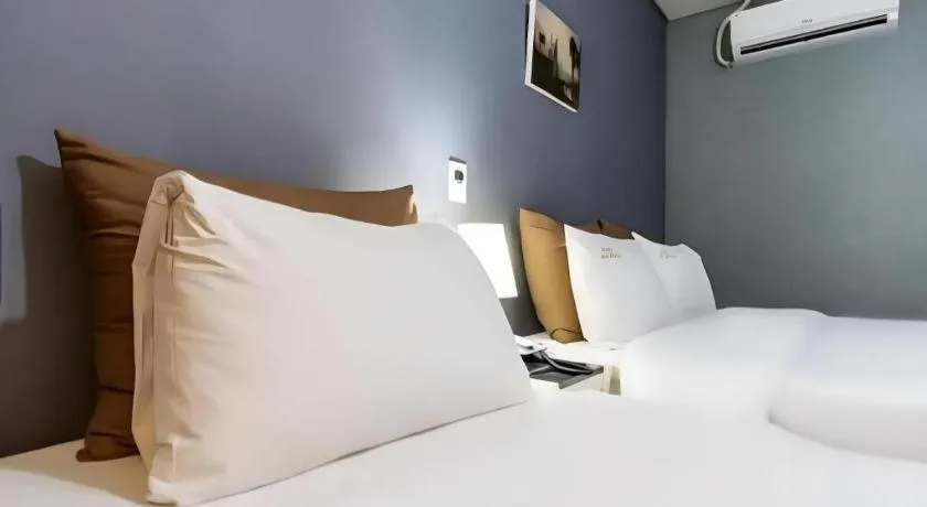 Bed in BENIKEA Technovalley Hotel