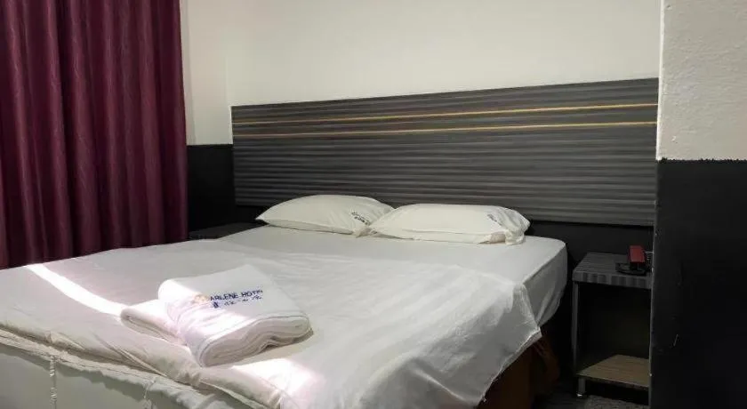 Bed in Darlene Hotel