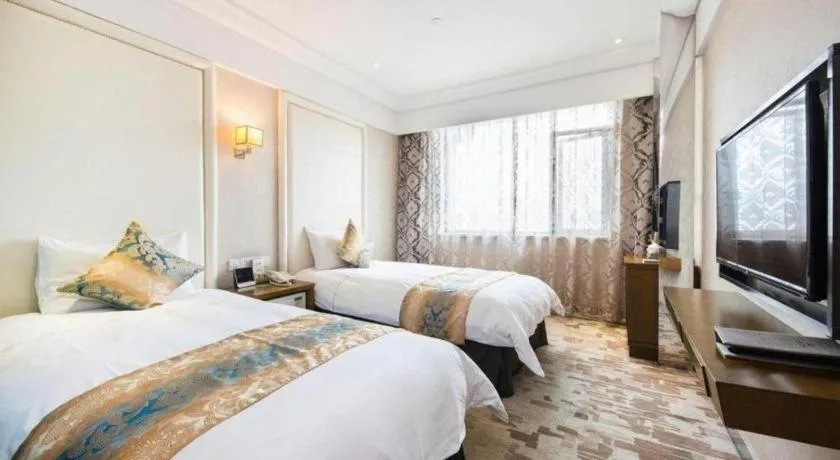 Bed in Nanjing Grand Da Qiao Hotel