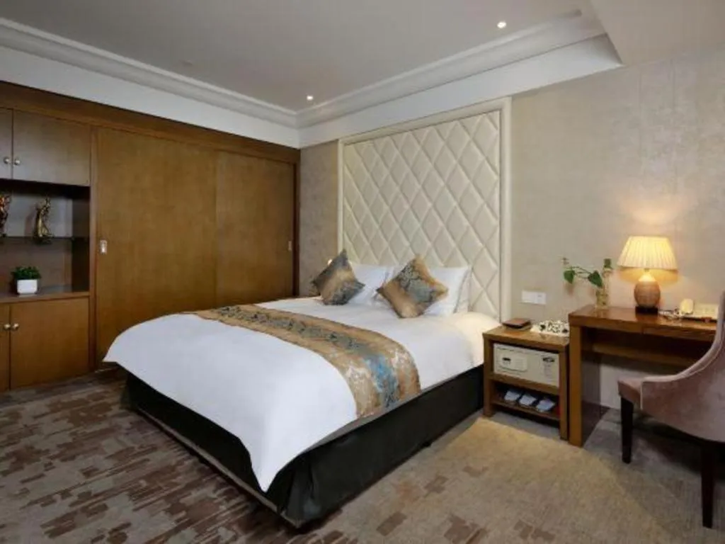 Bed in Nanjing Grand Da Qiao Hotel
