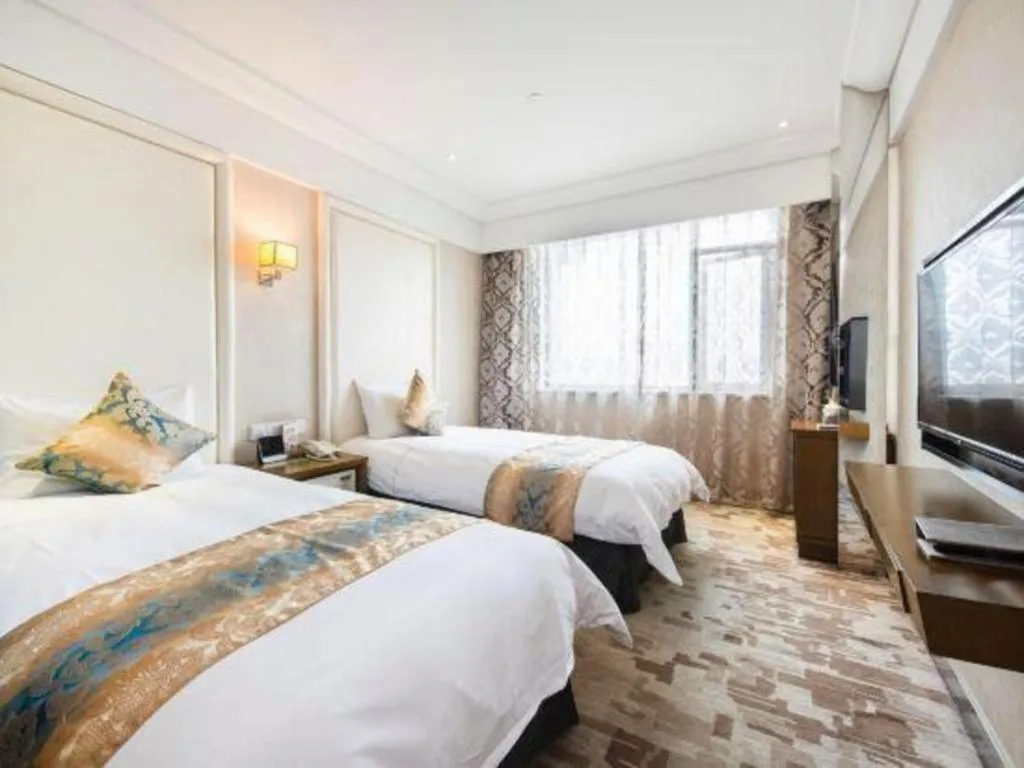 Bed in Nanjing Grand Da Qiao Hotel