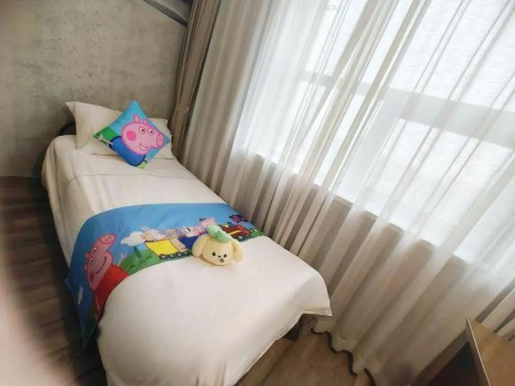 Bed in Nanjing Grand Da Qiao Hotel