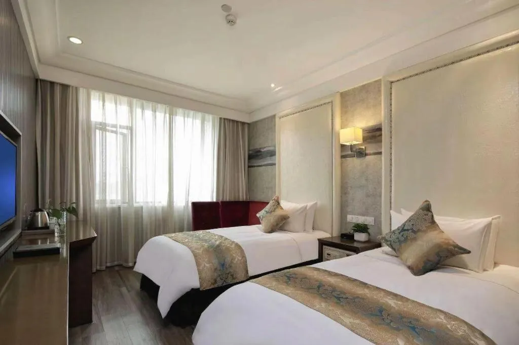 Bed in Nanjing Grand Da Qiao Hotel