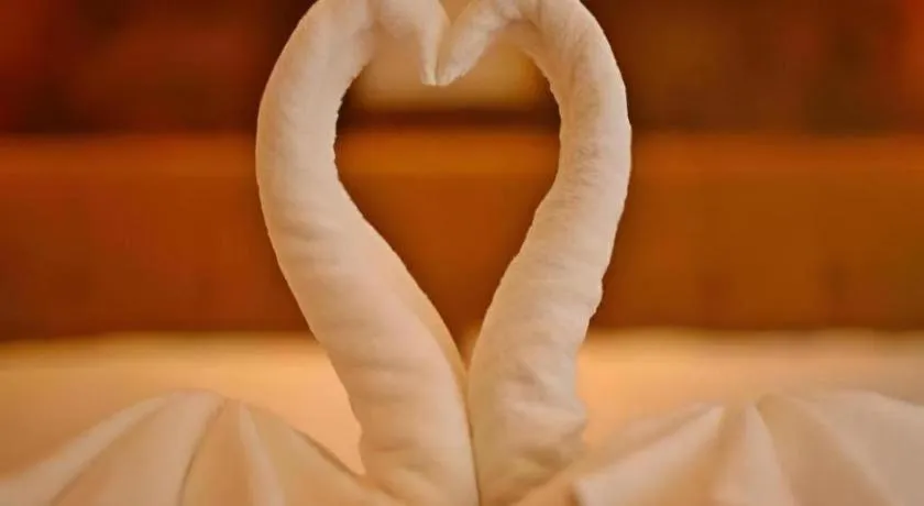 Bed in Lotusland Resort