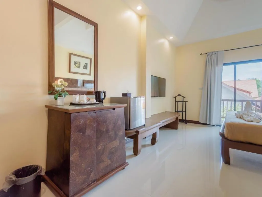 Bed in Lotusland Resort