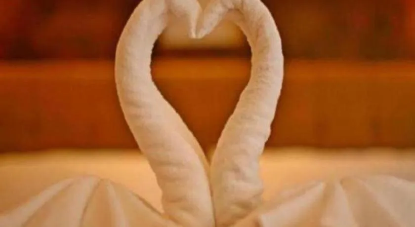 Bed in Lotusland Resort