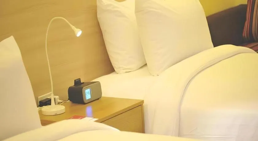 Bed in R-Con Hotel @ Siam