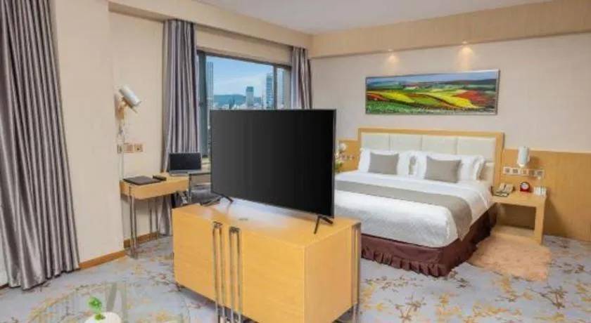 Bed in Kunming Jinjiang Hotel