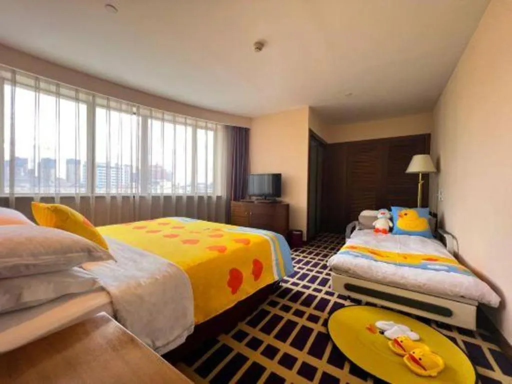 Bed in Kunming Jinjiang Hotel