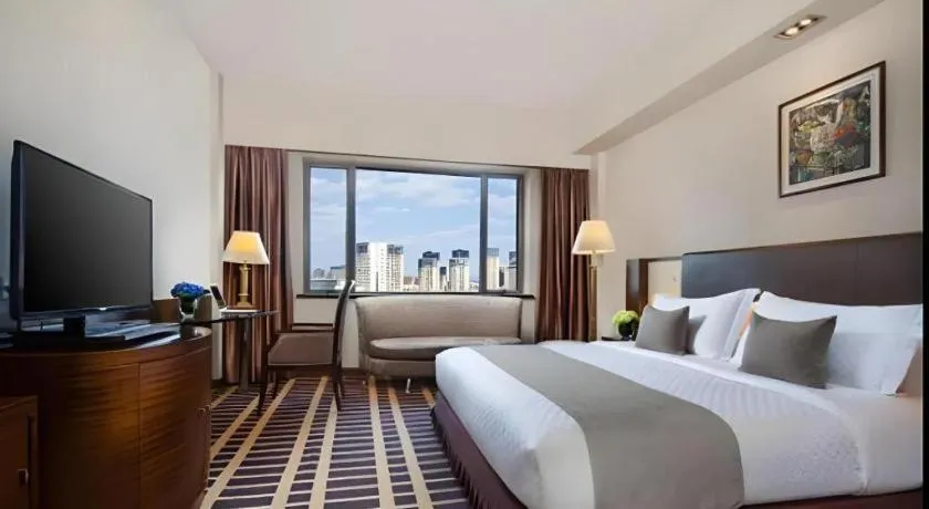 Bed in Kunming Jinjiang Hotel