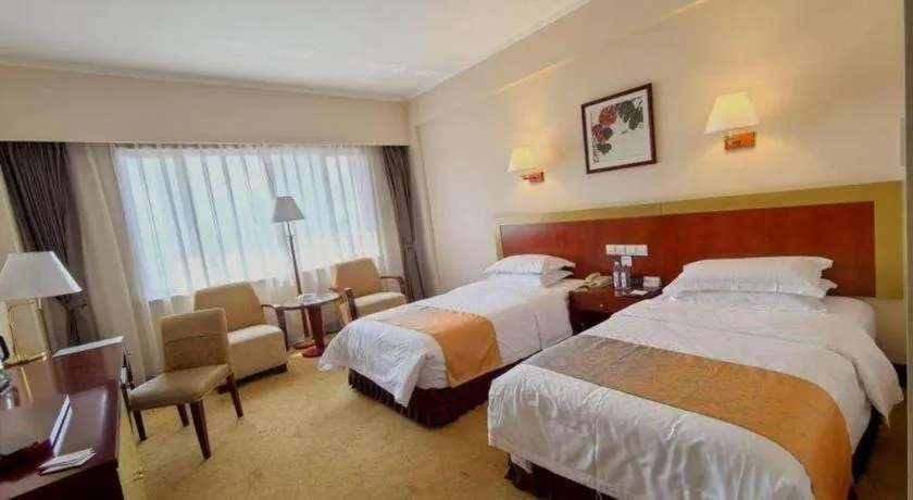 Bed in Kunming Jinjiang Hotel