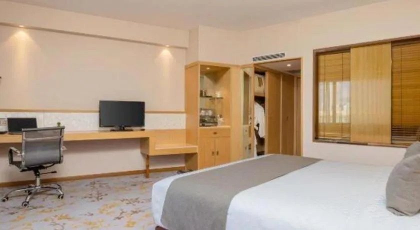 Bed in Kunming Jinjiang Hotel