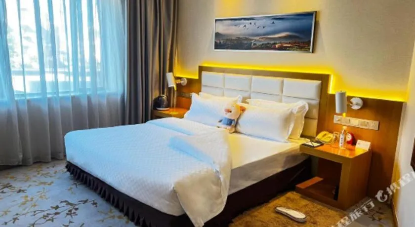 Bed in Kunming Jinjiang Hotel