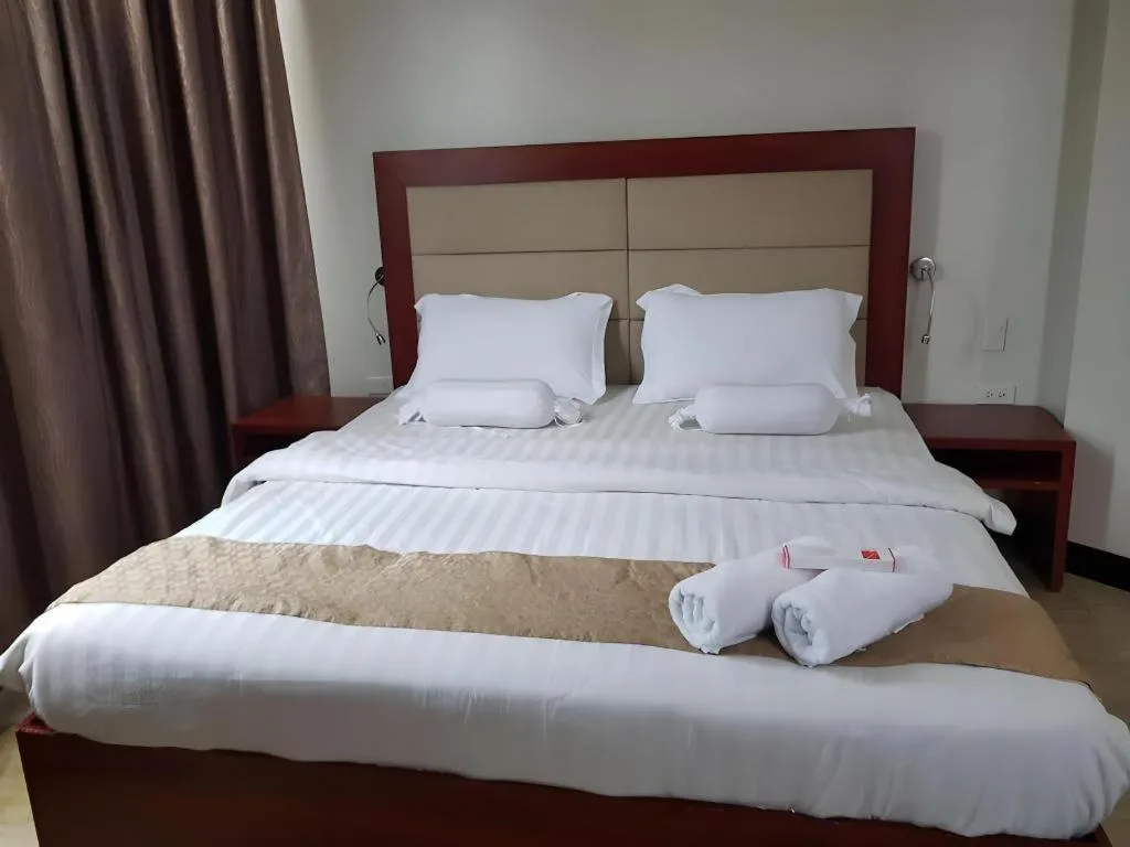 Bed in Cherry Midtown Hotel