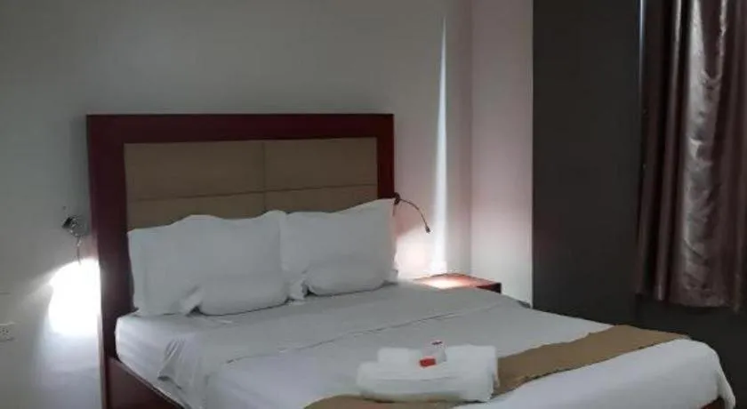 Bed in Cherry Midtown Hotel