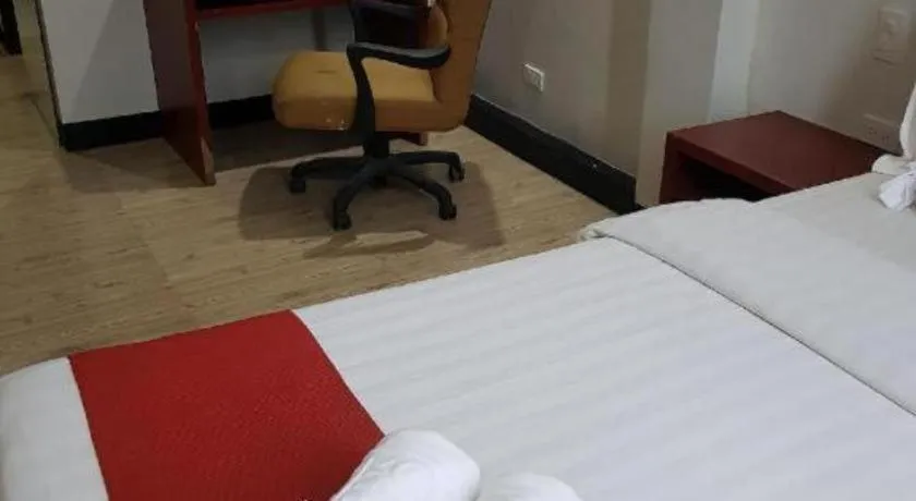 Bed in Cherry Midtown Hotel