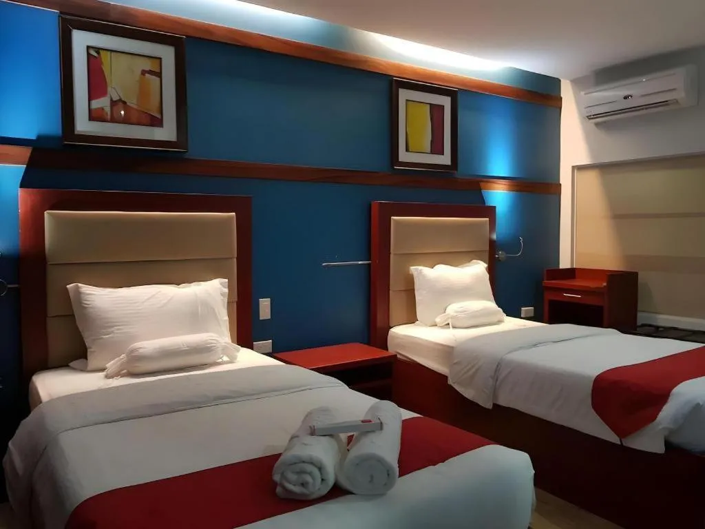 Bed in Cherry Midtown Hotel