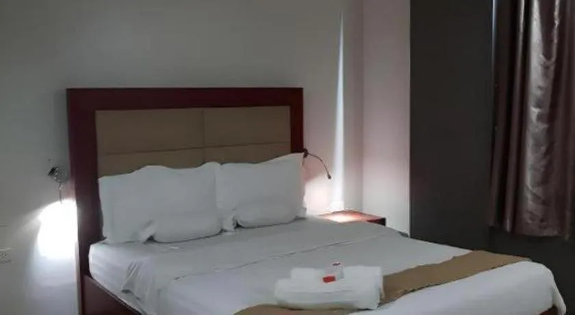 Bed in Cherry Midtown Hotel