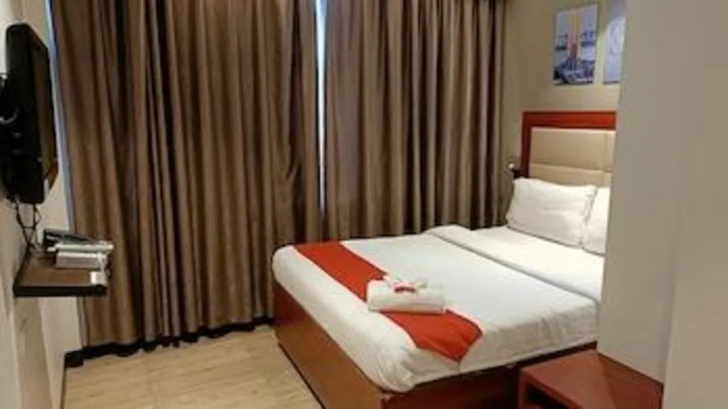 Bed in Cherry Midtown Hotel