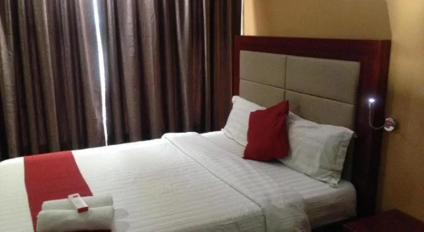 Bed in Cherry Midtown Hotel