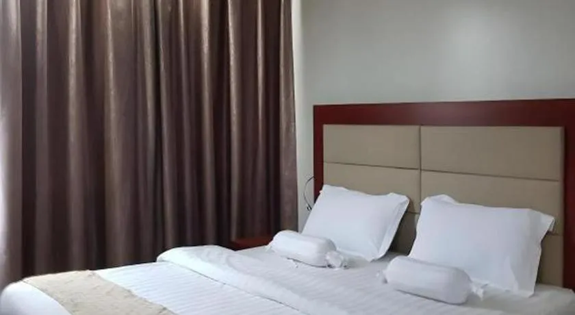 Bed in Cherry Midtown Hotel