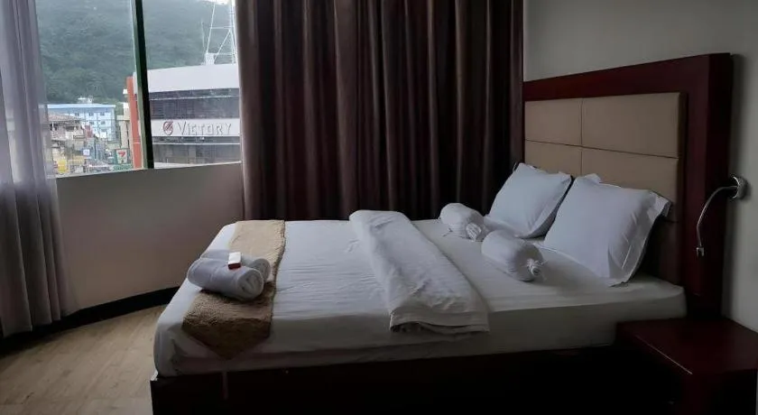 Bed in Cherry Midtown Hotel