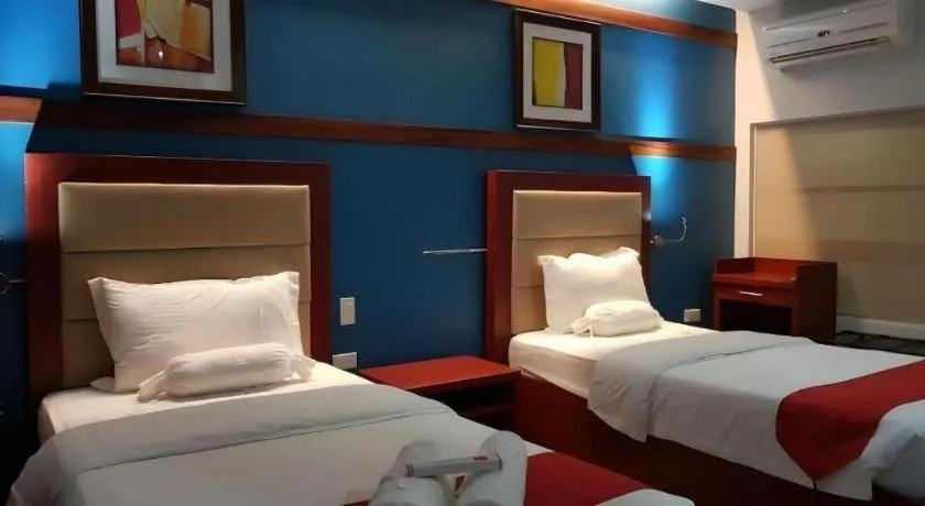 Bed in Cherry Midtown Hotel