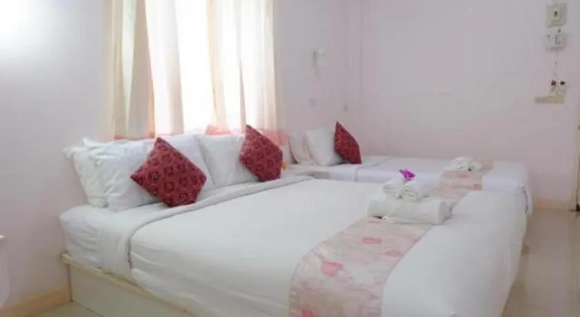 Bed in Wiangphumin Hotel