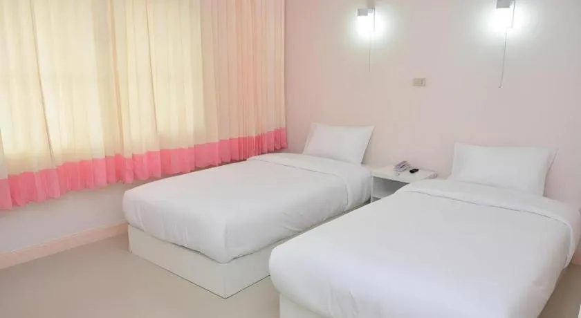 Bed in Wiangphumin Hotel