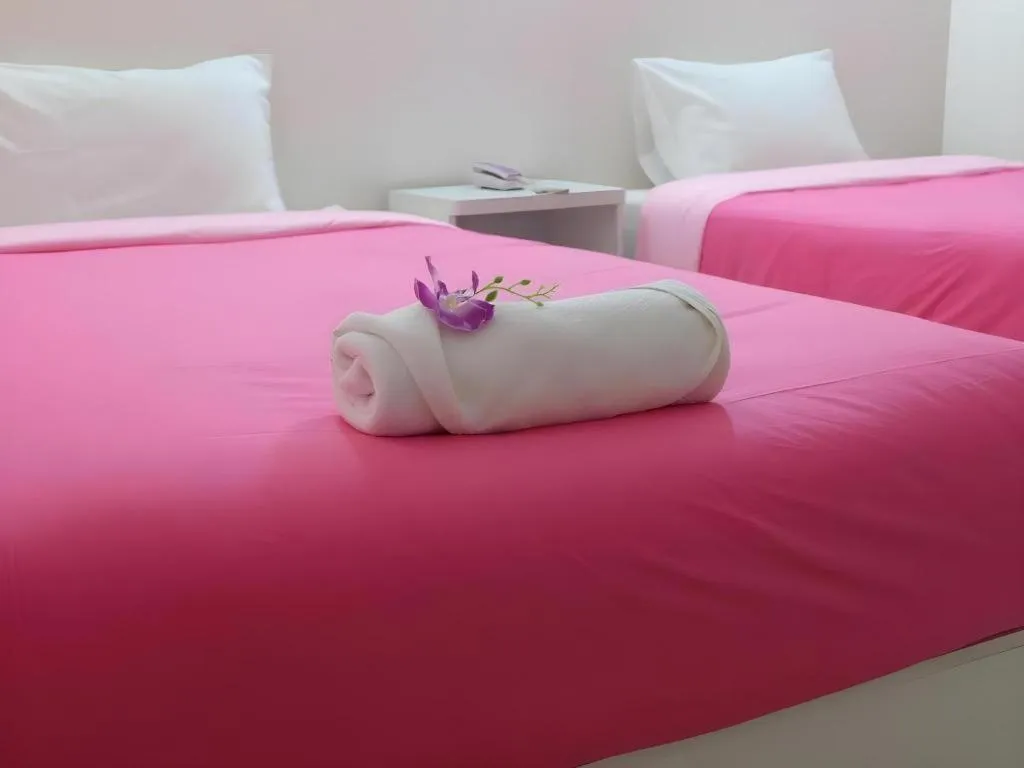 Bed in Wiangphumin Hotel