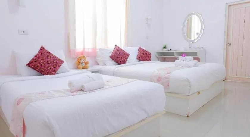 Bed in Wiangphumin Hotel