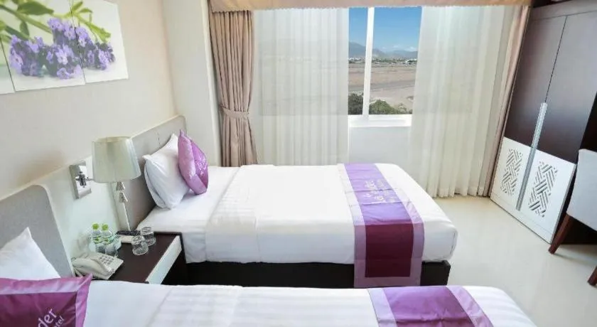 Bed in Lavender Nha Trang Hotel