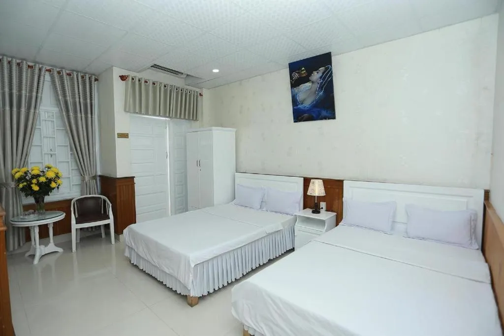 Bed in Thanh Long Hotel