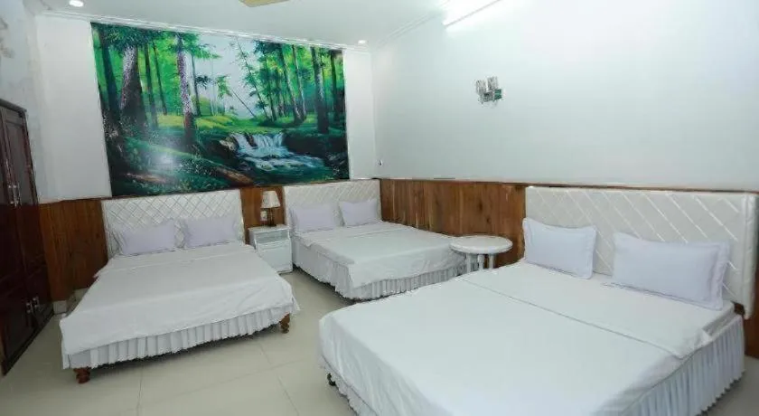 Bed in Thanh Long Hotel