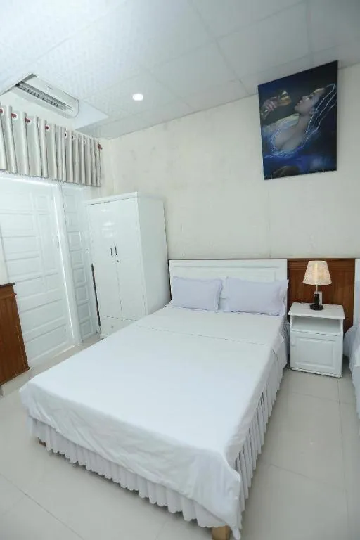 Bed in Thanh Long Hotel