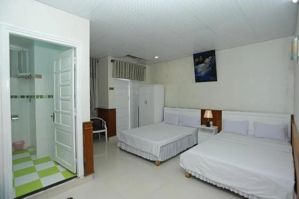 Bed in Thanh Long Hotel