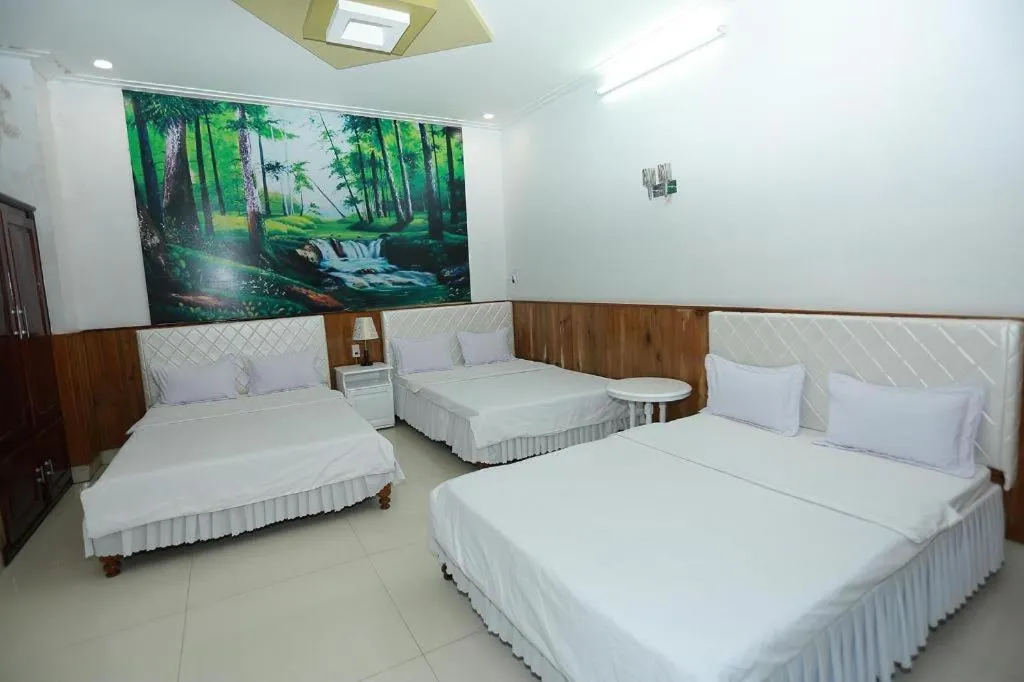 Bed in Thanh Long Hotel