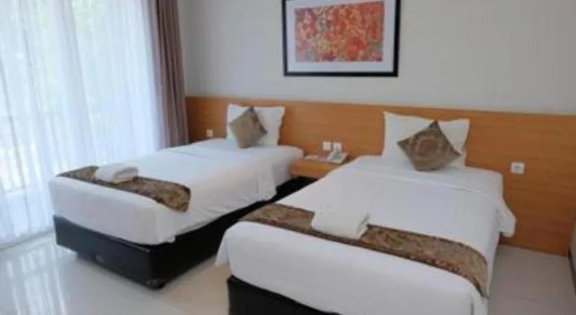 Bed in D'Season Premiere Hotel