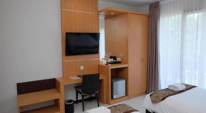 Bed in D'Season Premiere Hotel