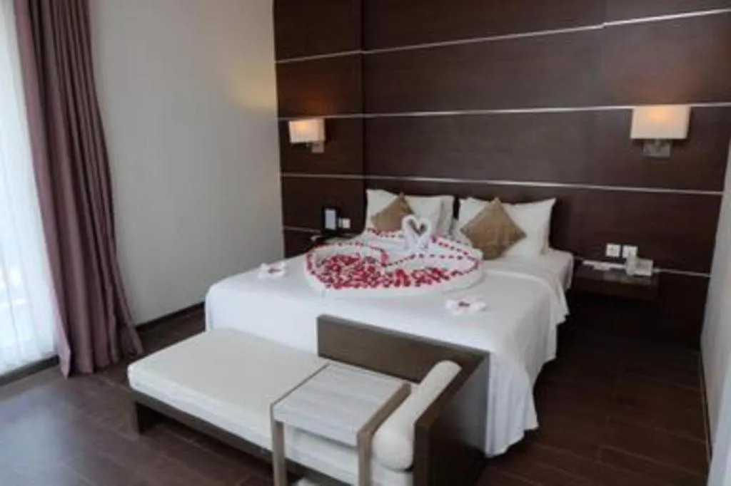 Bed in D'Season Premiere Hotel