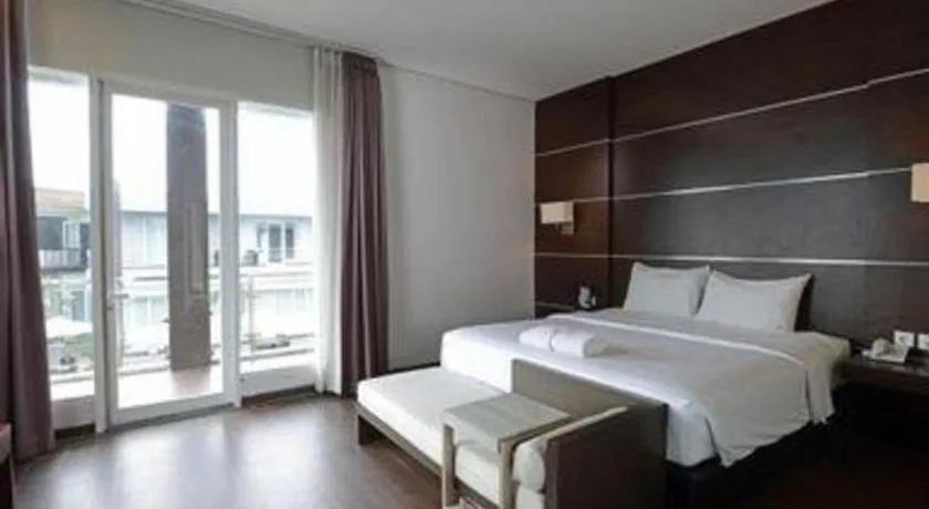 Bed in D'Season Premiere Hotel