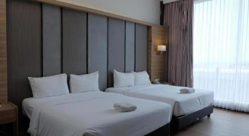 Bed in D'Season Premiere Hotel