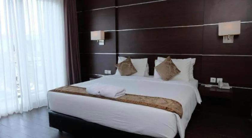 Bed in D'Season Premiere Hotel